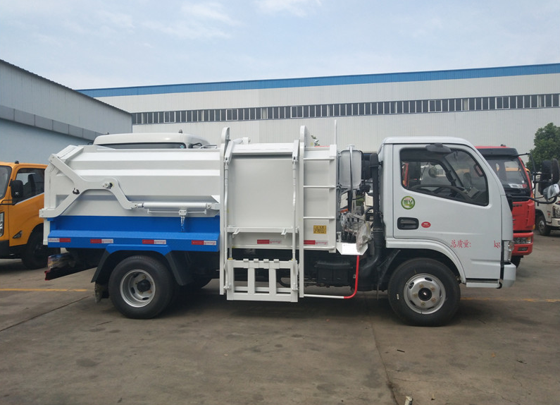東風(fēng)5方側(cè)裝壓縮式對(duì)接垃圾車-5方側(cè)裝壓縮式對(duì)接垃圾車