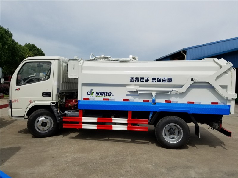 東風(fēng)5方側(cè)裝壓縮式對(duì)接垃圾車-5方側(cè)裝壓縮式對(duì)接垃圾車